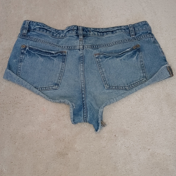 Free People ~ High Rise Distressed Denim Cutoff Cheeky Shorts, Size 29 - Picture 2 of 10